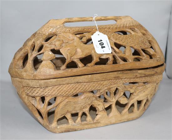 A Botswana wooden box, with carved animal design